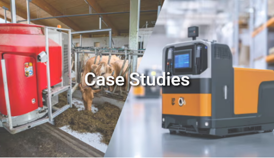 Image with the caption Case Studies and split image: on the left, a barn with cows and technical equipment; on the right, an autonomous transport vehicle in an industrial setting. The motif represents practical examples from agriculture and industry. Image with the caption Case Studies and split image: on the left, a barn with cows and technical equipment; on the right, an autonomous transport vehicle in an industrial setting. The motif represents practical examples from agriculture and industry.
