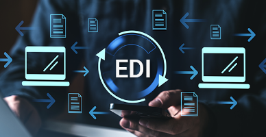 Graphic with ‘EDI’ in the center, surrounded by laptop and document icons and arrows indicating data transfer. The visual represents electronic data interchange and automated business processes. Graphic with ‘EDI’ in the center, surrounded by laptop and document icons and arrows indicating data transfer. The visual represents electronic data interchange and automated business processes.